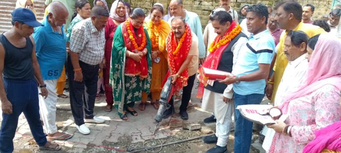 MLA Bahu, Ch Vikram Randhawa kick starting lane and drain work at Kaccha Talab, Ward No. 47 on Saturday. MLA Bahu, Ch Vikram Randhawa kick starting lane and drain work at Kaccha Talab, Ward No. 47 on Saturday.
