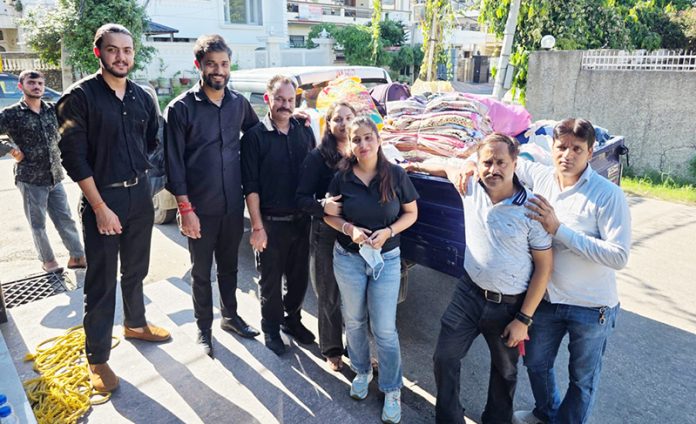 The team of Wellness Zone Headmasters along with relief material at SKUAST-J in RS Pura, Jammu.