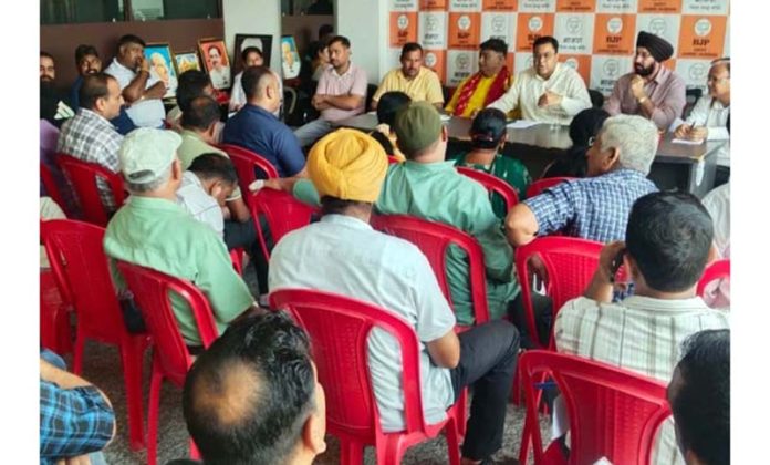 Senior BJP leaders and Border District functionaries discussing Seva Pakhwada activities during a workshop on Thursday.