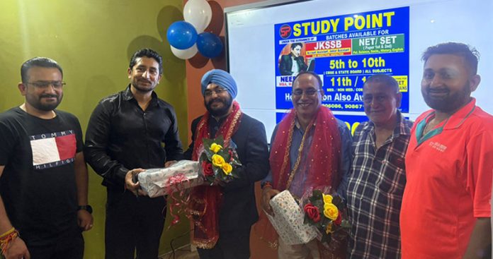 Neeraj Mahajan, MD Study Point felicitating guests during a function in Jammu. Neeraj Mahajan, MD Study Point felicitating guests during a function in Jammu.