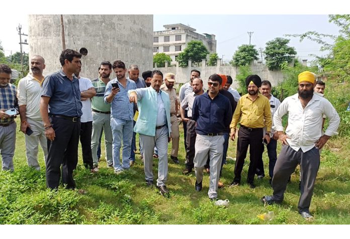 JMC Commissioner Dr Devansh Yadav inspecting flood-hit Gangyal-Babliana area on Tuesday.