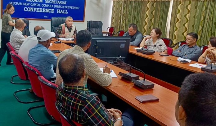 Secretary to Govt of Mizoram Amit Sharma chairing a meeting on Sunday.