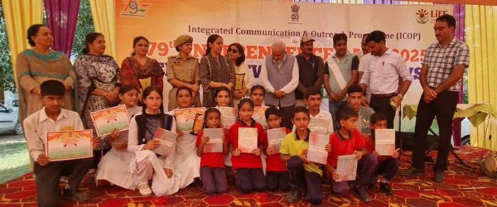 Students and others during an event organised by Central Bureau of Communication, Rajouri on Saturday.