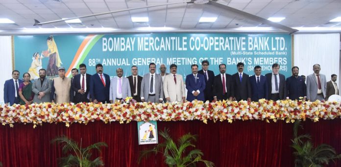Dignitaries during 88th AGM of Bombay Mercantile Cooperative Bank in Mumbai on Friday. Dignitaries during 88th AGM of Bombay Mercantile Cooperative Bank in Mumbai on Friday.