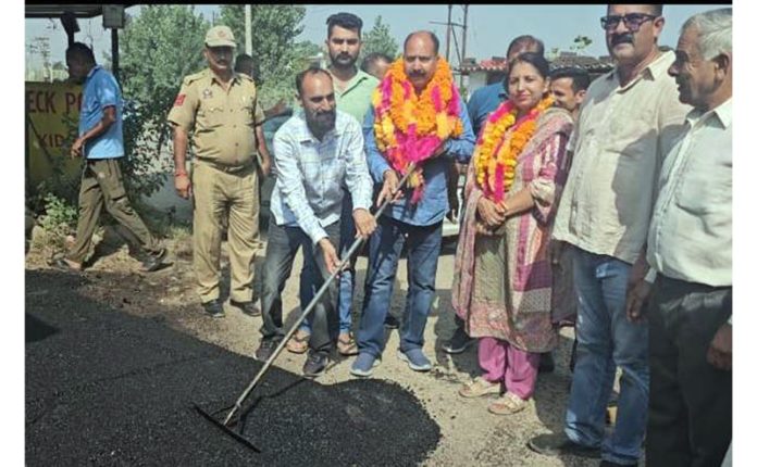 MLA Bishnah, Dr Rajiv Bhagat, kickstarting a road macadamization work in Bishnah area on Tuesday.