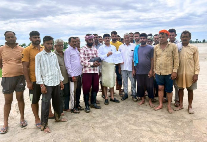 Congress leader, Yashpal Kundal during a visit to heavy rainfall hit Galad village in Ramgarh.