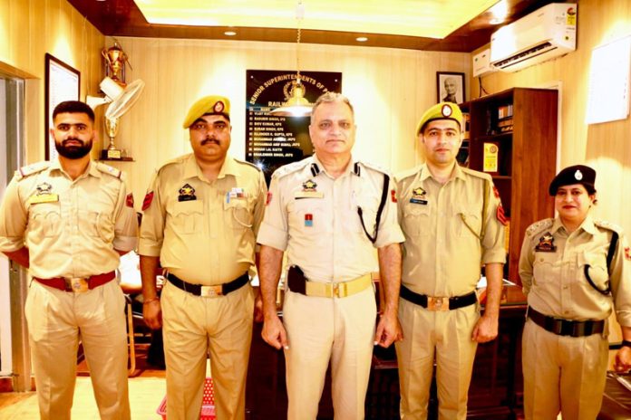 SSP GRP Jammu Shailender Singh, along with the newly promoted HCs posing for a group photograph at former's office on Monday.