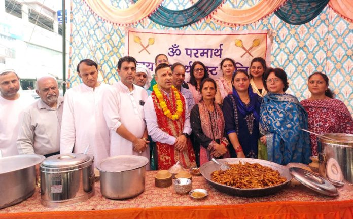 Dignitaries and Trust members posing together during Bhandara programme at Patta Paloura, Jammu.