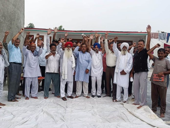 JKSAC activists staging brief protest after a meeting in Bishnah area of Jammu on Friday.
