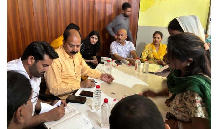 MLA Bishnah listening to the public grievances during a Janta Darbar in Bishnah on Thursday.