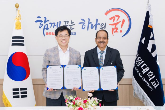SKUAST-J VC and President of Kangwon National University, Chuncheon, South Korea displaying copies of MoU.