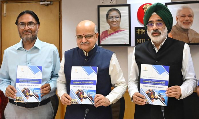 NITI Aayog CEO BVR Subrahmanyam with other senior officer during the release of the report NITI Tax Policy Working Paper Series- I 'Enhancing Certainty, Transparency and Uniformity in Permanent Establishment and Profit Attribution for Foreign Investors in India', in New Delhi on Friday.