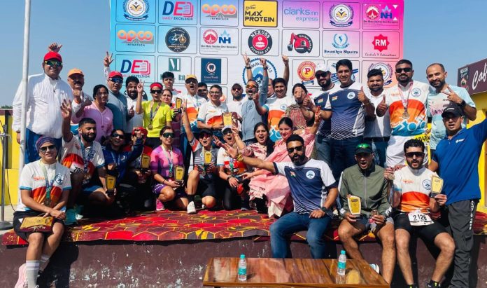 Winners of Jammu Duathlon 70.3 posing with their trophies and medals during the prize distribution ceremony. Winners of Jammu Duathlon 70.3 posing with their trophies and medals during the prize distribution ceremony.