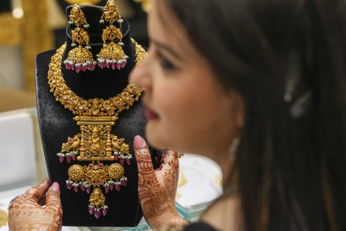 Gold nears Rs 1 lakh-mark in Delhi on weak dollar