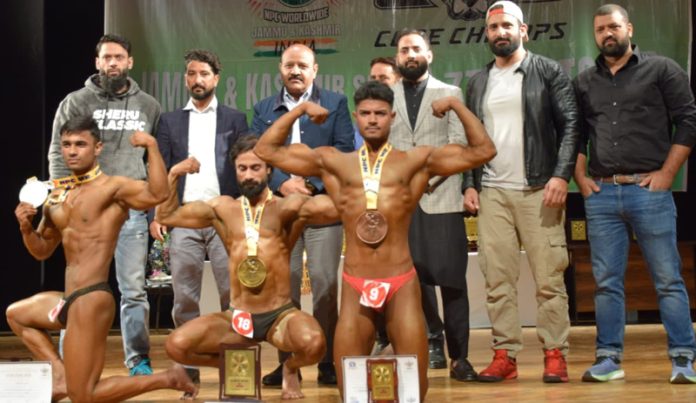 DyCM Surinder Choudhary posing along with body builders in Srinagar. DyCM Surinder Choudhary posing along with body builders in Srinagar.