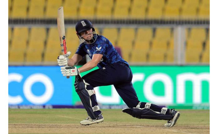 Heather Knight playing a shot during her inning of unbeaten 79 runs against Bangladesh in Guwahati.