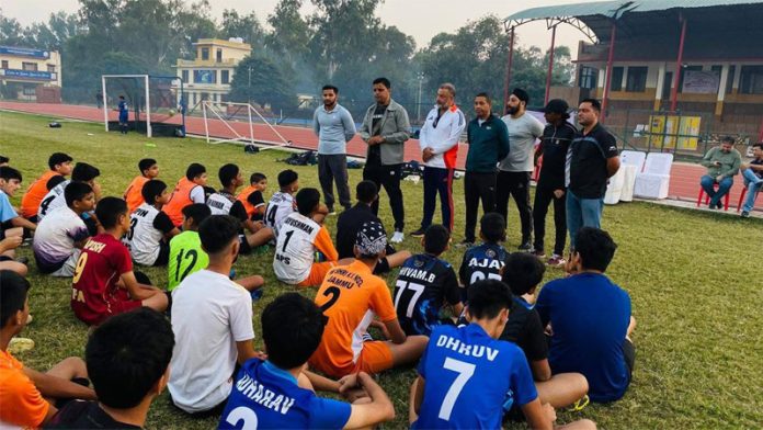 Arun Malhotra interacting with budding players at Jammu University. Arun Malhotra interacting with budding players at Jammu University.