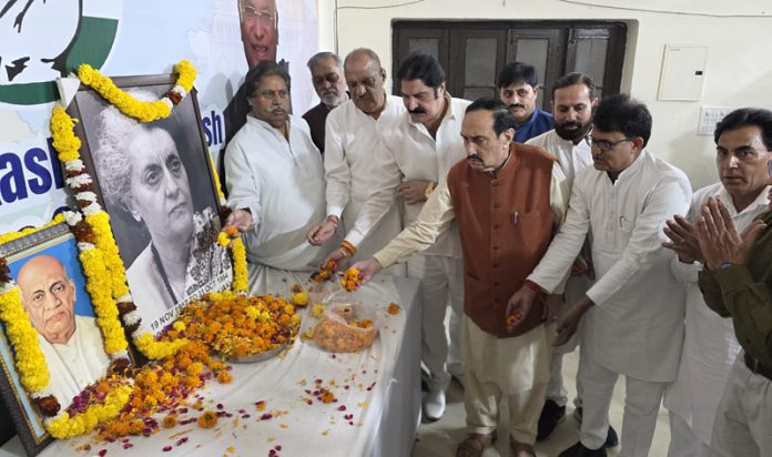 Senior Congress leaders paying homage to Indira Gandhi and Sardar Patel during a function in Jammu. -Excelsior/Rakesh Senior Congress leaders paying homage to Indira Gandhi and Sardar Patel during a function in Jammu. -Excelsior/Rakesh