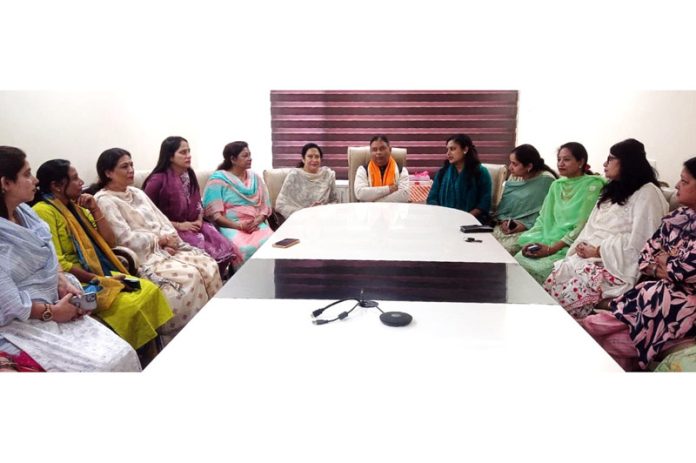 MP (Rajya Sabha), Sat Sharma chairing a meeting in Jammu.