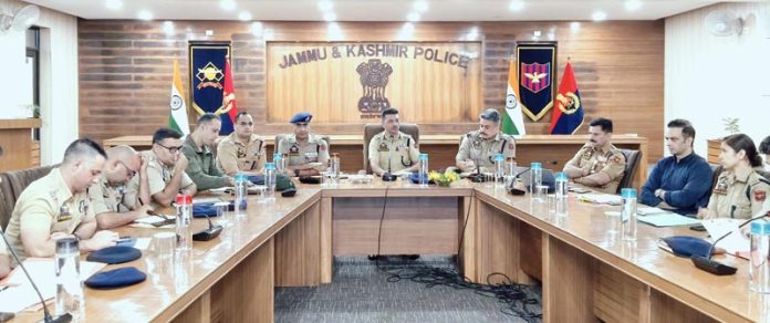 SSP Jammu Joginder Singh chairing a crime and security review meeting at DPL Jammu.