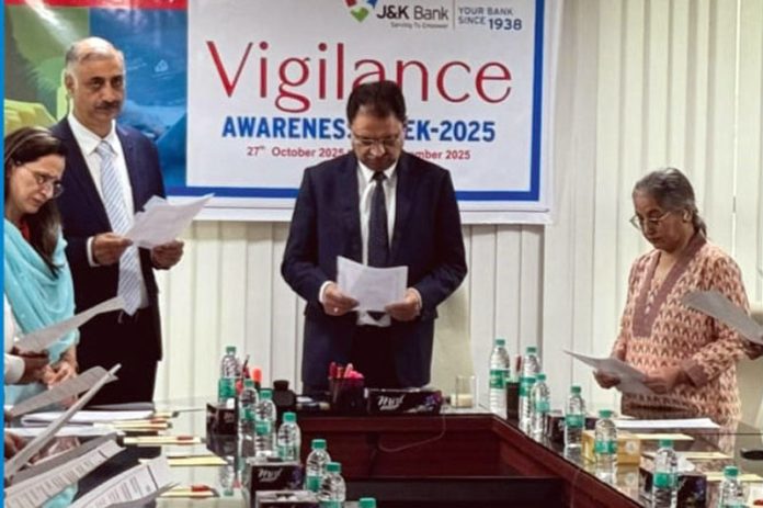 MD & CEO JK Bank administering pledge on Monday.