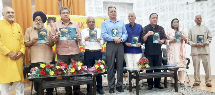 Guests along with eminent literary figures releasing a short story book on foundation day of Adbi Kunj Jammu.