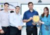 DC Jammu being presented memento by RTI Principal Sunaina Sharma during a function on Monday.
