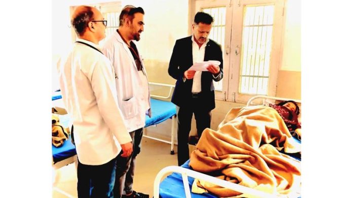 DHS Jammu Dr Abdul Hamid Zargar with doctors in a patient ward at CHC Gandoh, Doda district.