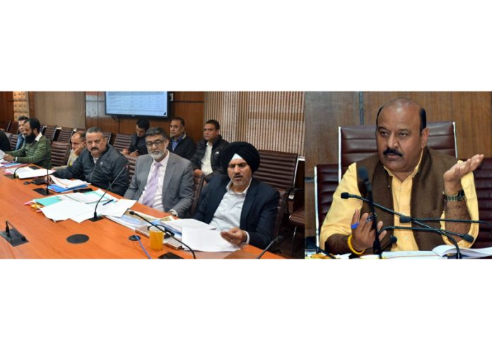 Dy CM Surinder Choudhary chairing a meeting on Wednesday.