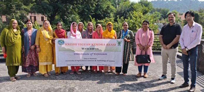 KVK Reasi scientists with the Self Help Groups members posing for a photograph.
