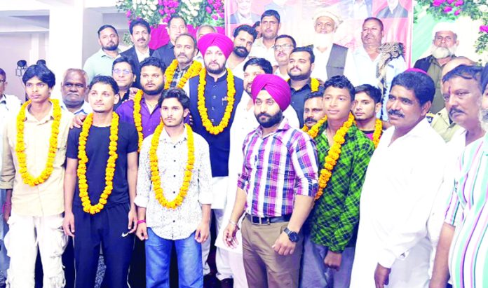 Several youth from BJP joining NC in Reasi on Friday.