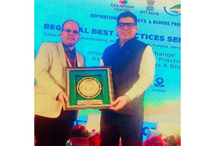 DC Sandeep Kumar Sharma chairing a meeting in Rajouri.