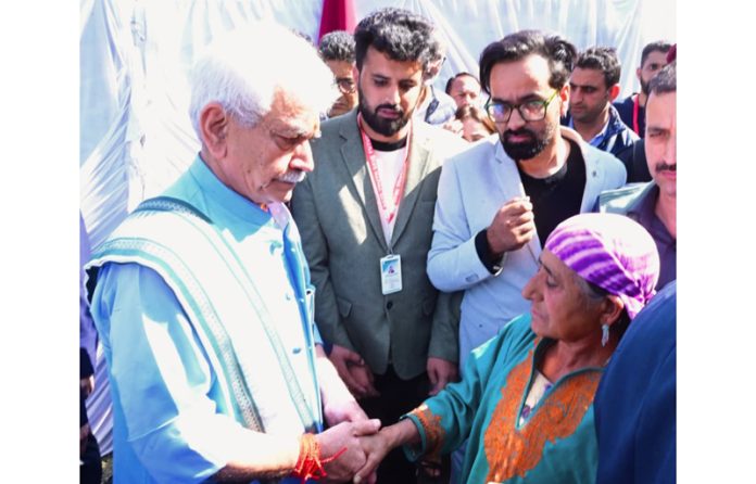 LG Manoj Sinha meeting member of a terror victim family in Kupwara on Wednesday. LG Manoj Sinha meeting member of a terror victim family in Kupwara on Wednesday.