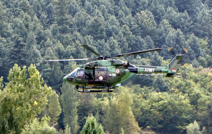Army helicopter pressed into service over dense forests of Gadol, Kokernag on Wednesday.