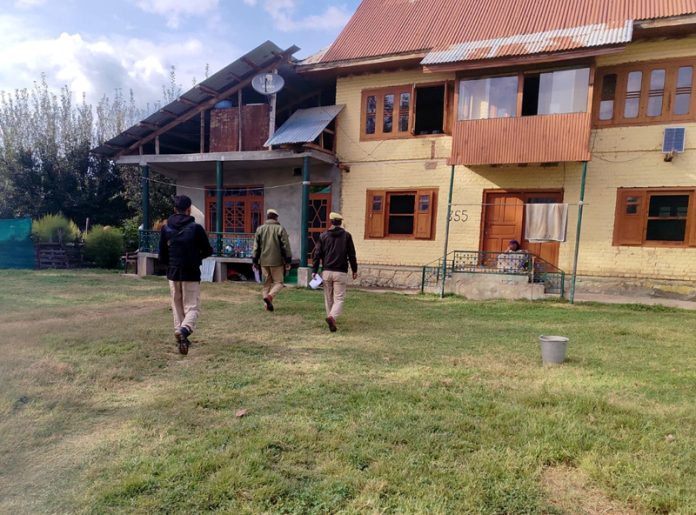 Police during search of a house in Kashmir on Wednesday. Police during search of a house in Kashmir on Wednesday.