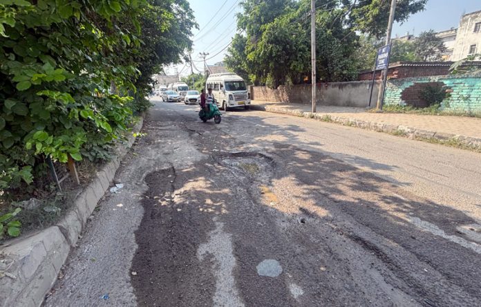 Road leading to Jogi Gate lying in worst condition in Jammu. -Excelsior/Rakesh