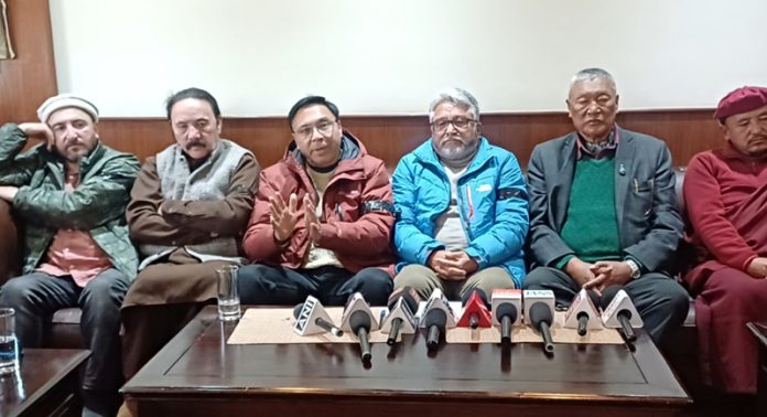 LAB and KDA leaders addressing a press conference in Leh on Tuesday.