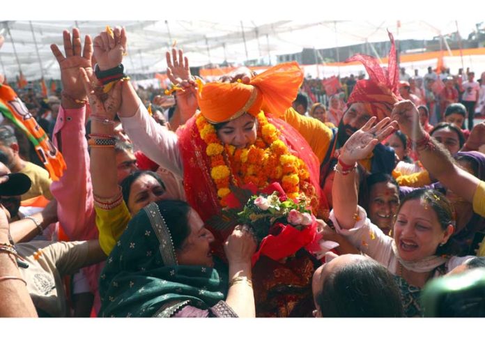 BJP candidate Devyani Rana during a mammoth election rally in Nagrota segment on Saturday. -Excelsior/ Rakesh