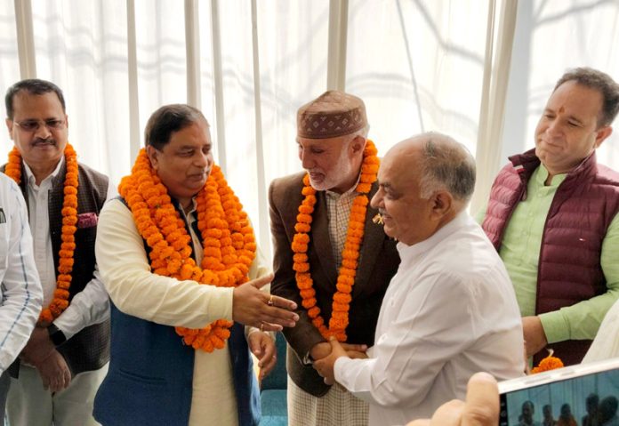 BJP leaders during a meeting in Srinagar on Sunday, where candidates for the Rajya Sabha election were felicitated. -Excelsior/Shakeel BJP leaders during a meeting in Srinagar on Sunday, where candidates for the Rajya Sabha election were felicitated. -Excelsior/Shakeel