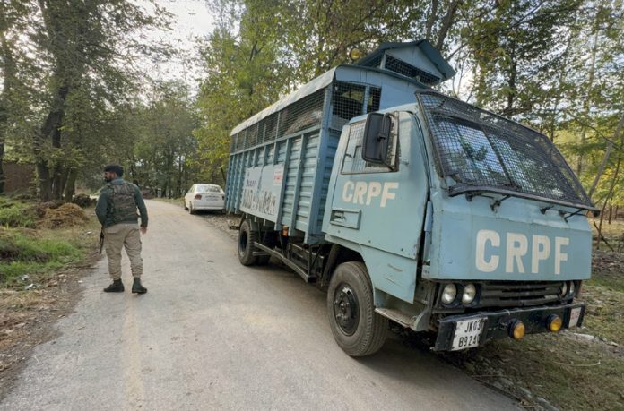 An SIA team during raid at Badasgam on Wednesday. -Excelsior/Sajad Dar An SIA team during raid at Badasgam on Wednesday. -Excelsior/Sajad Dar