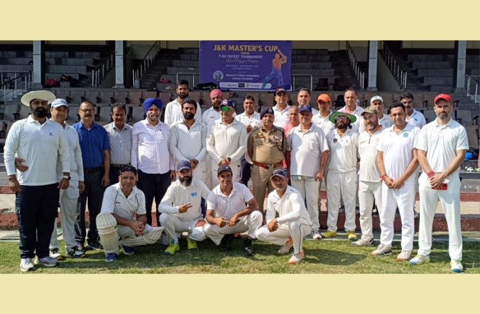 Office bearers of VCA J&K and players posing with DIG JSK Range Shiv Kumar Sharma at MA Stadium, Jammu.