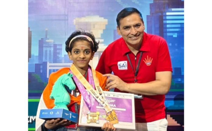 Atul Kumar Gupta Head of Delegation posing along with Sharvaanica AS.