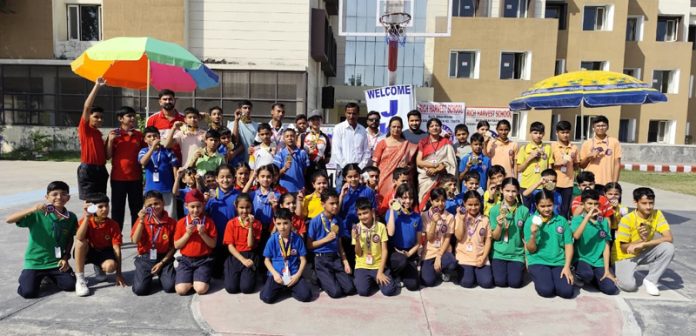 Skaters posing with medals alongside dignitaries during prize distribution ceremony. Skaters posing with medals alongside dignitaries during prize distribution ceremony.