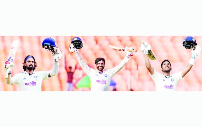 Rahul, Jadeja & Jurel raising thier bats after scoring centuries against West Indies.
