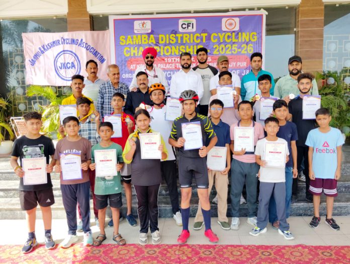 Young cyclists posing along with certificates during closing ceremony. Young cyclists posing along with certificates during closing ceremony.