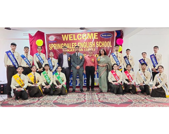 Newly elected Students Council posing along with school management.