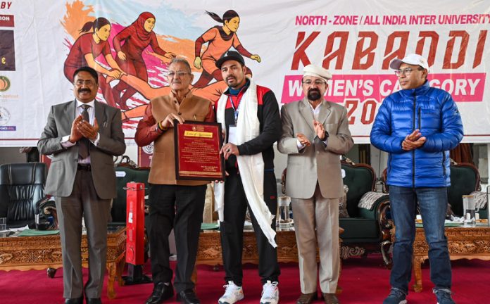 LG Ladakh Kavinder Gupta presenting an appreciation certificate to Volleyball coach Mohd Javeed. LG Ladakh Kavinder Gupta presenting an appreciation certificate to Volleyball coach Mohd Javeed.