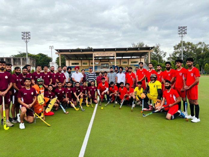 Players posing for a group photograph during Inter-Collegiate Hockey Tournament at University of Jammu.