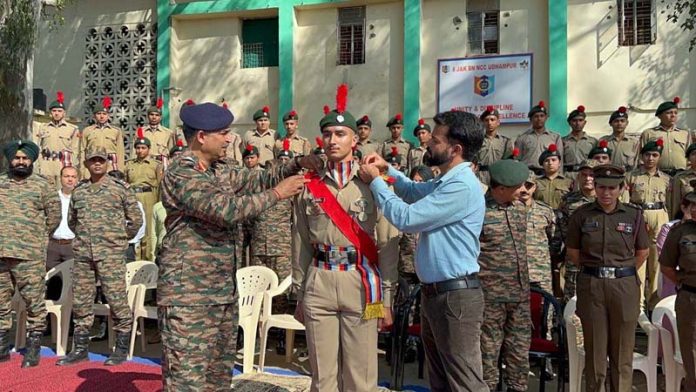 An Army officer felicitating NCC cadet at Udhampur.
