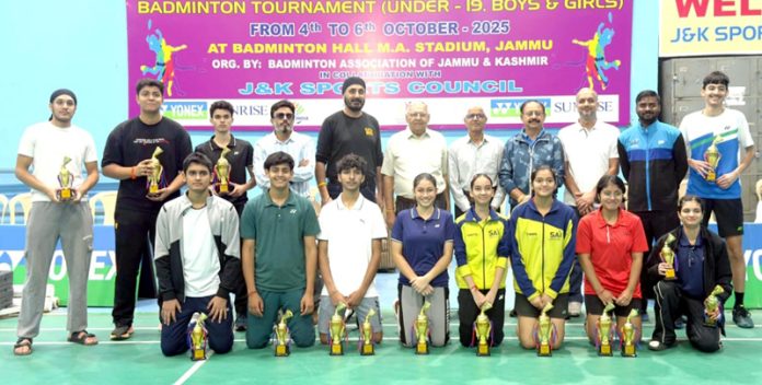 Champions of different categories display their trophies during concluding ceremony at MA Stadium.